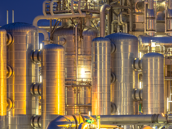 Alloy selection for service in nitric acid